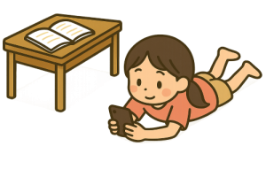 勉強そっちのけでスマホに夢中な女の子
